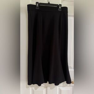 Briggs jet black midi skirt with ruffle bottom, back zip closure in size 8